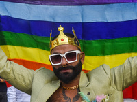 Participants from the LGBTQ+ community are seen dressed in various attire during the annual pride walk in Kolkata, India, on December 15, 20...