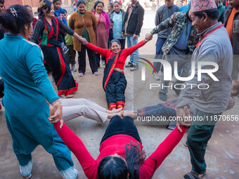 Local residents play a traditional Newari game in Bhaktapur, Nepal, on Sunday. (