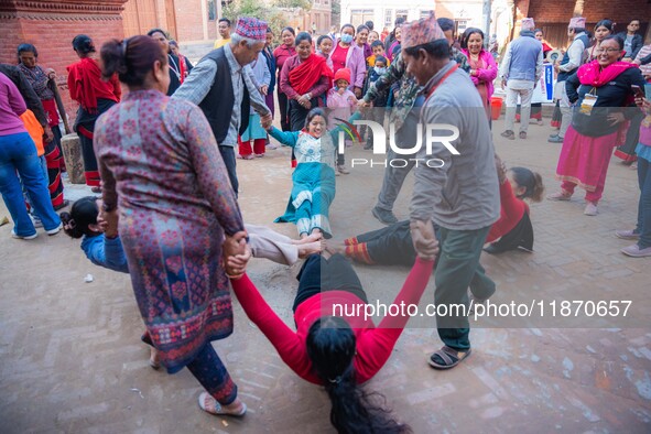 Local residents play a traditional Newari game in Bhaktapur, Nepal, on Sunday. 