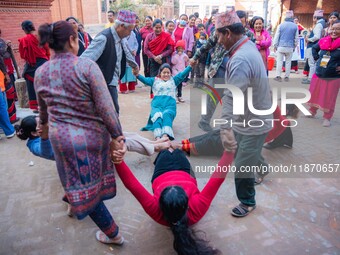 Local residents play a traditional Newari game in Bhaktapur, Nepal, on Sunday. (