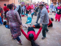 Local residents play a traditional Newari game in Bhaktapur, Nepal, on Sunday. (