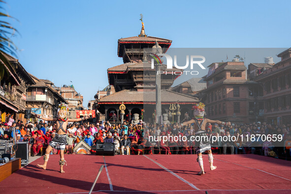 Masked dancers perform a traditional Newari dance during the Bhaktapur Mahotsav (Bhaktapur Street Festival) in Bhaktapur, Nepal, on Sunday. 