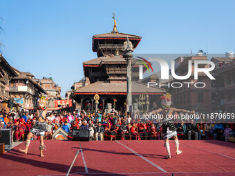 Masked dancers perform a traditional Newari dance during the Bhaktapur Mahotsav (Bhaktapur Street Festival) in Bhaktapur, Nepal, on Sunday....