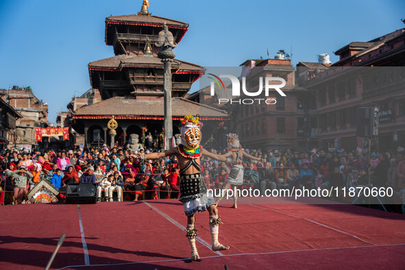 Masked dancers perform a traditional Newari dance during the Bhaktapur Mahotsav (Bhaktapur Street Festival) in Bhaktapur, Nepal, on Sunday. 