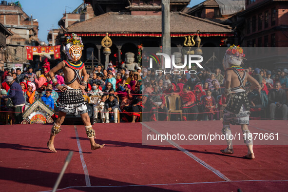 Masked dancers perform a traditional Newari dance during the Bhaktapur Mahotsav (Bhaktapur Street Festival) in Bhaktapur, Nepal, on Sunday. 