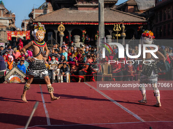 Masked dancers perform a traditional Newari dance during the Bhaktapur Mahotsav (Bhaktapur Street Festival) in Bhaktapur, Nepal, on Sunday....