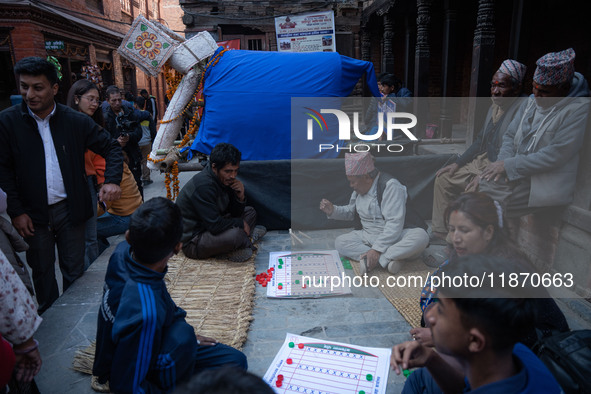 Local residents play a traditional Newari game in Bhaktapur, Nepal, on Sunday. 