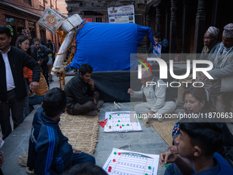 Local residents play a traditional Newari game in Bhaktapur, Nepal, on Sunday. (