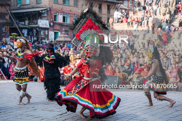 Masked dancers perform a traditional Newari dance during the Bhaktapur Mahotsav (Bhaktapur Street Festival) in Bhaktapur, Nepal, on Sunday. 