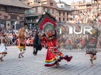 Masked dancers perform a traditional Newari dance during the Bhaktapur Mahotsav (Bhaktapur Street Festival) in Bhaktapur, Nepal, on Sunday....