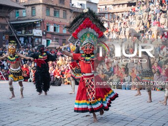 Masked dancers perform a traditional Newari dance during the Bhaktapur Mahotsav (Bhaktapur Street Festival) in Bhaktapur, Nepal, on Sunday....