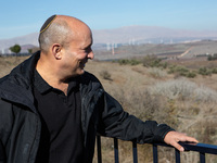 Former Israeli Prime Minister Naftali Bennett visits a lookout point next to the boundary fence delineating the UN-patrolled buffer zone bet...