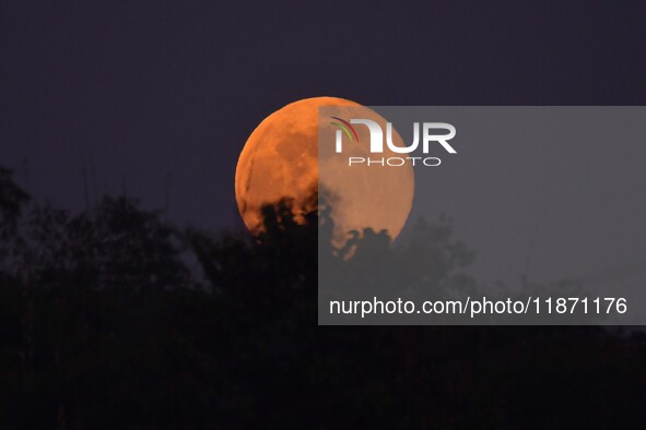 The Cold Moon is seen in the sky from Morigaon District in Assam, India, on December 15, 2024. The ''Cold Moon'' is the last full moon of 20...