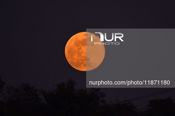 The Cold Moon is seen in the sky from Morigaon District in Assam, India, on December 15, 2024. The ''Cold Moon'' is the last full moon of 20...