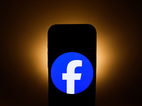 Facebook logo displayed on a phone screen is seen in this illustration photo taken in Poland on December 15, 2024. (