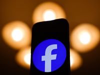 Facebook logo displayed on a phone screen is seen in this illustration photo taken in Poland on December 15, 2024. (