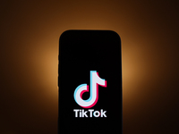 TikTok logo displayed on a phone screen is seen in this illustration photo taken in Poland on December 15, 2024. (