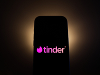 Tinder logo displayed on a phone screen is seen in this illustration photo taken in Poland on December 15, 2024. (