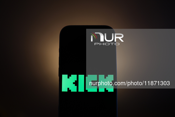 Kick logo displayed on a phone screen is seen in this illustration photo taken in Poland on December 15, 2024. 