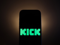 Kick logo displayed on a phone screen is seen in this illustration photo taken in Poland on December 15, 2024. (