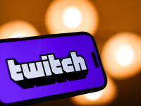 Twitch logo displayed on a phone screen is seen in this illustration photo taken in Poland on December 15, 2024. (