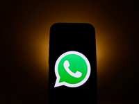 WhatsApp logo displayed on a phone screen is seen in this illustration photo taken in Poland on December 15, 2024. (