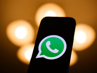 WhatsApp logo displayed on a phone screen is seen in this illustration photo taken in Poland on December 15, 2024. (