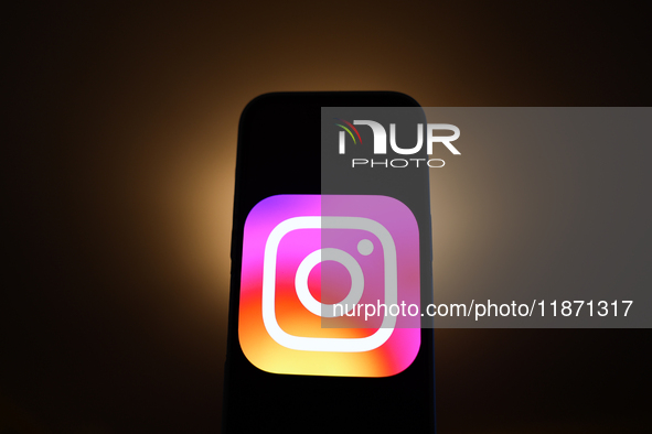 Instagram logo displayed on a phone screen is seen in this illustration photo taken in Poland on December 15, 2024. 