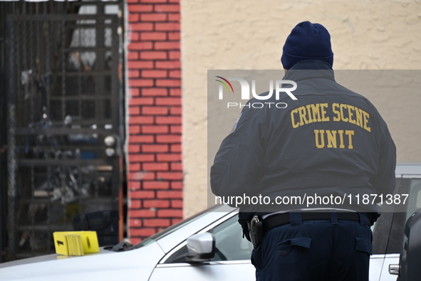 Philadelphia Police crime scene unit investigators are at the scene where one person is killed and four other people are injured in a mass s...