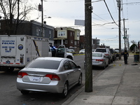 Philadelphia Police crime scene unit investigators are at the scene where one person is killed and four other people are injured in a mass s...