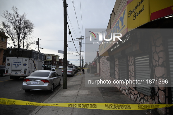 Philadelphia Police crime scene unit investigators are at the scene where one person is killed and four other people are injured in a mass s...