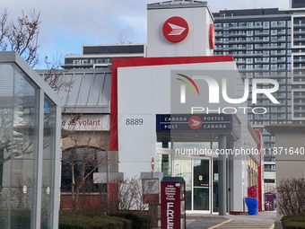 A Canada Post office is seen in Richmond Hill, Ontario, Canada, on December 15, 2024. Canada Post stops delivering mail across the country a...