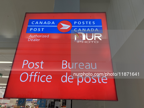 A Canada Post sign is seen in Toronto, Ontario, Canada, on December 15, 2024. Canada Post stops delivering mail across the country as Canada...