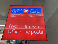 A Canada Post sign is seen in Toronto, Ontario, Canada, on December 15, 2024. Canada Post stops delivering mail across the country as Canada...