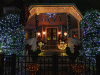 Houses and their gardens in the Celebration region in Florida are decorated with the Christmas theme on October 13. (