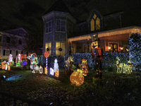 Houses and their gardens in the Celebration region in Florida are decorated with the Christmas theme on October 13. (