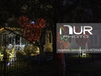 Houses and their gardens in the Celebration region in Florida are decorated with the Christmas theme on October 13. (