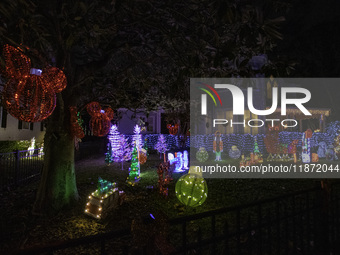 Houses and their gardens in the Celebration region in Florida are decorated with the Christmas theme on October 13. (