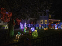 Houses and their gardens in the Celebration region in Florida are decorated with the Christmas theme on October 13. (