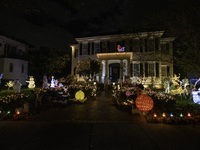 Houses and their gardens in the Celebration region in Florida are decorated with the Christmas theme on October 13. (