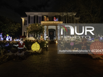 Houses and their gardens in the Celebration region in Florida are decorated with the Christmas theme on October 13. (