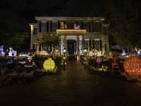 Houses and their gardens in the Celebration region in Florida are decorated with the Christmas theme on October 13. (