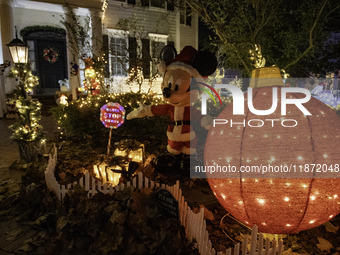 Houses and their gardens in the Celebration region in Florida are decorated with the Christmas theme on October 13. (