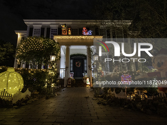 Houses and their gardens in the Celebration region in Florida are decorated with the Christmas theme on October 13. (