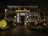 Houses and their gardens in the Celebration region in Florida are decorated with the Christmas theme on October 13. (