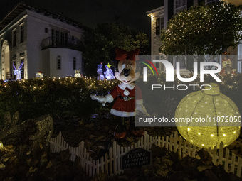 Houses and their gardens in the Celebration region in Florida are decorated with the Christmas theme on October 13. (