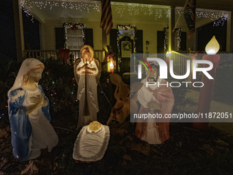 Houses and their gardens in the Celebration region in Florida are decorated with the Christmas theme on October 13. (