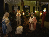 Houses and their gardens in the Celebration region in Florida are decorated with the Christmas theme on October 13. (