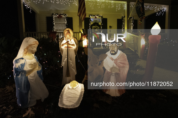 Houses and their gardens in the Celebration region in Florida are decorated with the Christmas theme on October 13. 