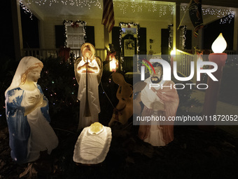 Houses and their gardens in the Celebration region in Florida are decorated with the Christmas theme on October 13. (